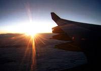 Pohled na zpad slunce z letadla